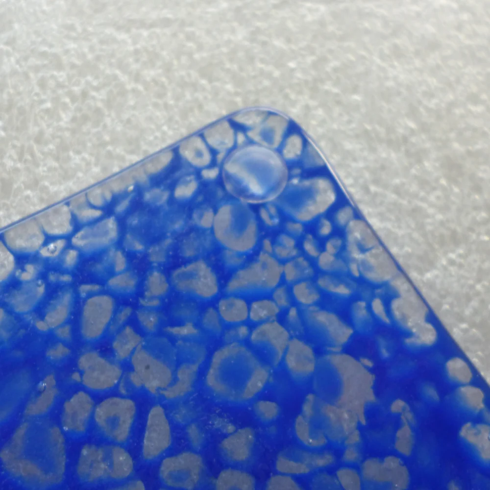 back of blue coaster showing bumper attached