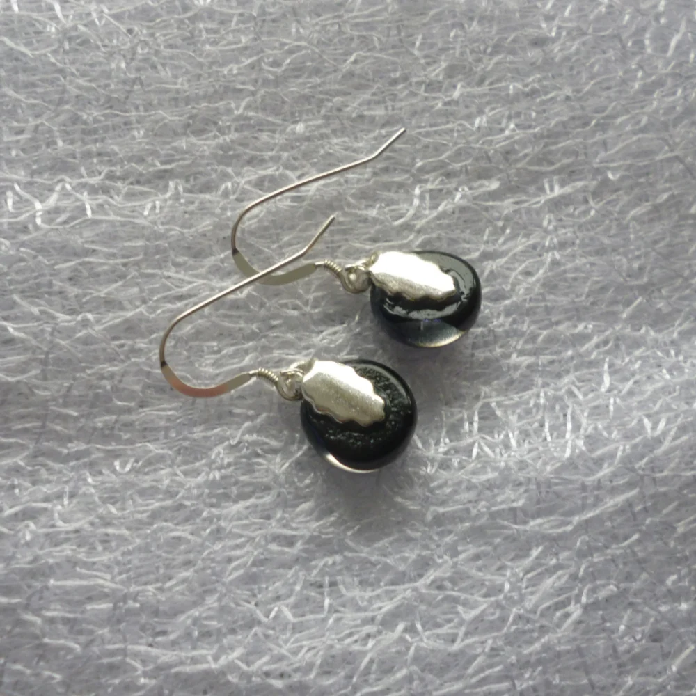 Back of round cabochons are black and attached to silver plated and 925 sterling silver earwires.