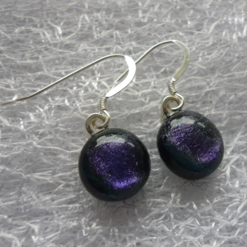 Purple dichroic glass dangle earrings with silver plated bail and 925 sterling silver ear wires.