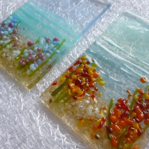 Side view of seaside suncatchers with very tactile flowers.