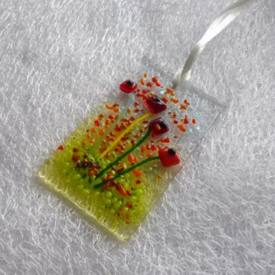 Fused glass flower decoration from a different angle.