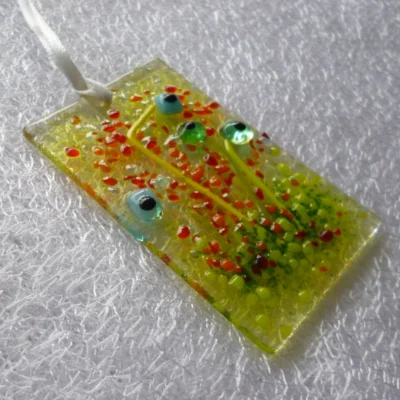 View of turquoise flower suncatcher from a different angle.
