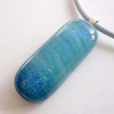 Side view of dichroic glass pendant