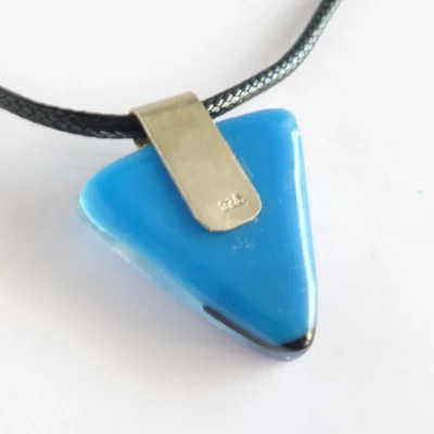Back of blue pendant with sterling silver bail