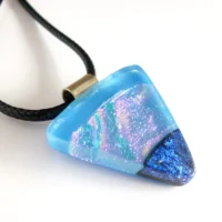 Handmade blue dichroic glass pendant with sterling silver bail and black cord necklace