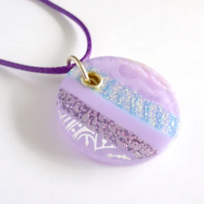 Large lilac dichroic glass pendant necklace with purple cord