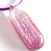 Side view and close up of pendant necklace