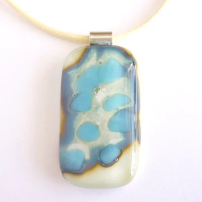 Front view of fused glass pendant with unique pattern