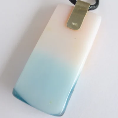 Back of fused glass pendant with sterling silver bail