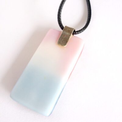 White base glass for fused glass pendant with 925 sterling silver bail attached.