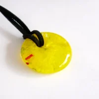 Handmade yellow fused glass pendant with touches of red