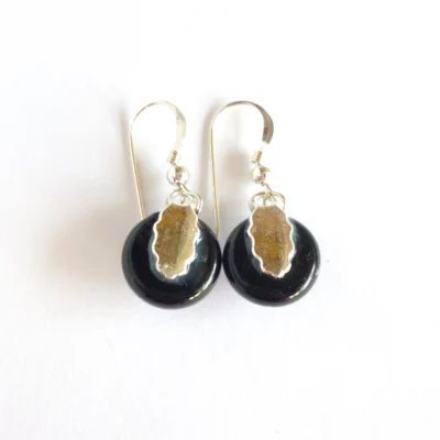 Back of pink dichroic glass earrings are black with silver plated bails and 925 sterling silver ear hooks attached.