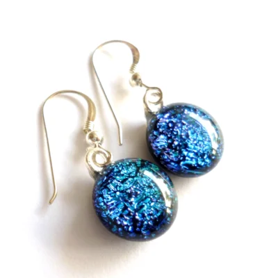 Teal blue cabochon fused dichroic glass earrings with silver plated bails and 925 sterling silver ear wires.