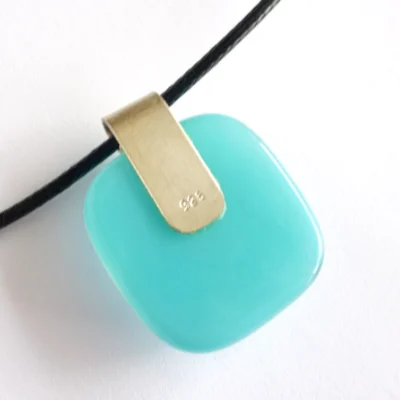 Back of turquoise blue pendant with large 925 sterling silver bail attached.